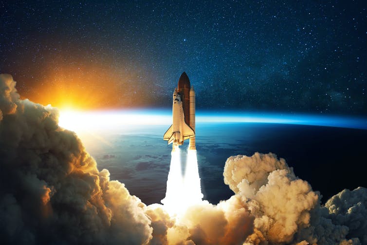 Transbordador espacial abandona la atmósfera terrestre
